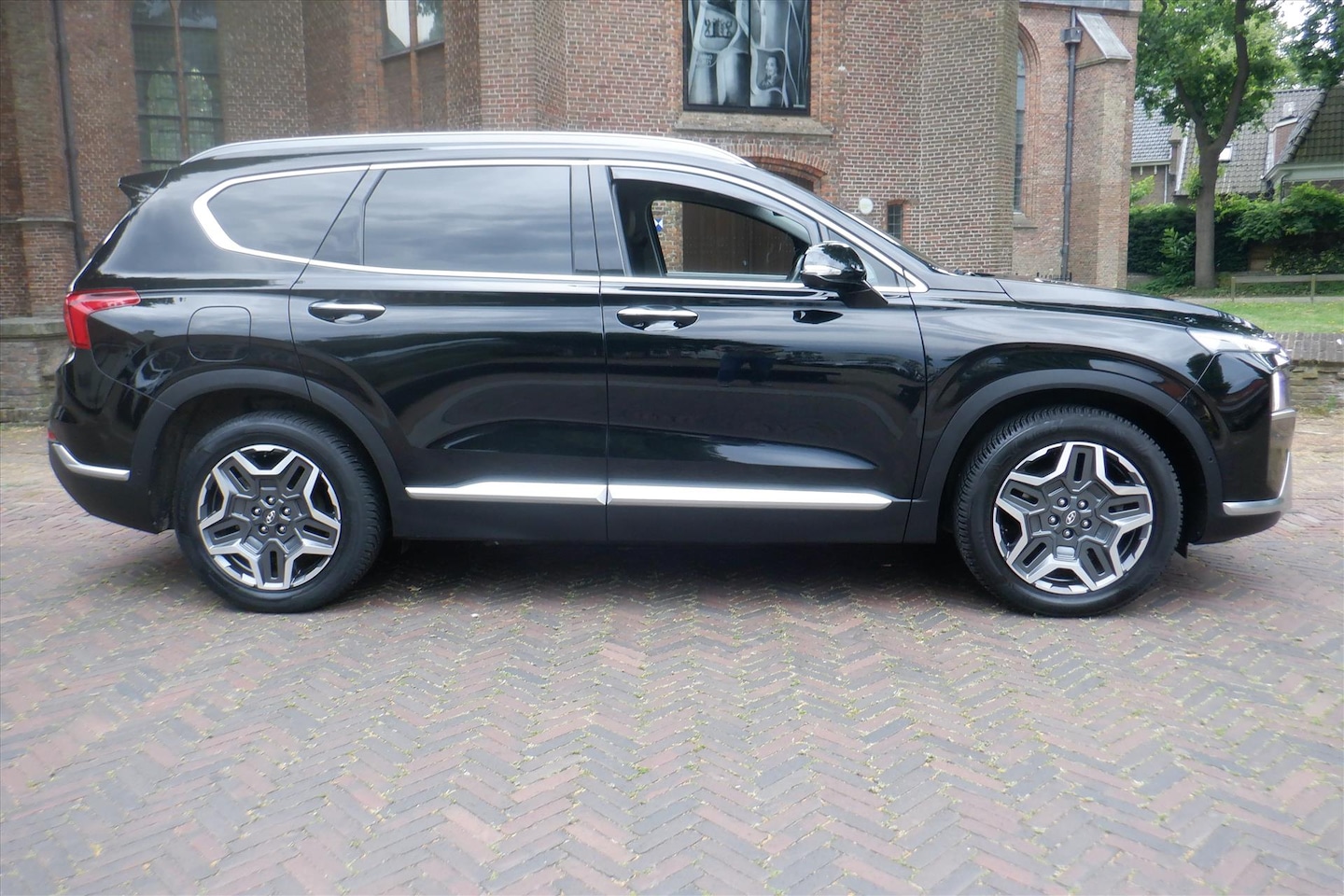 Hyundai Santa Fe - 1.6 T-GDi PHEV 265pk Aut. (7-zitter) Premium-PAN.DAK-HEAD-UP-LEER-BOVAG - AutoWereld.nl
