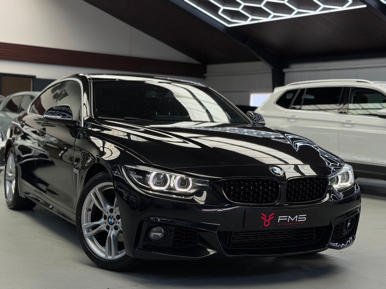 BMW 4-serie Gran Coupé - 418i M-Pakket High Executive Edition - AutoWereld.nl