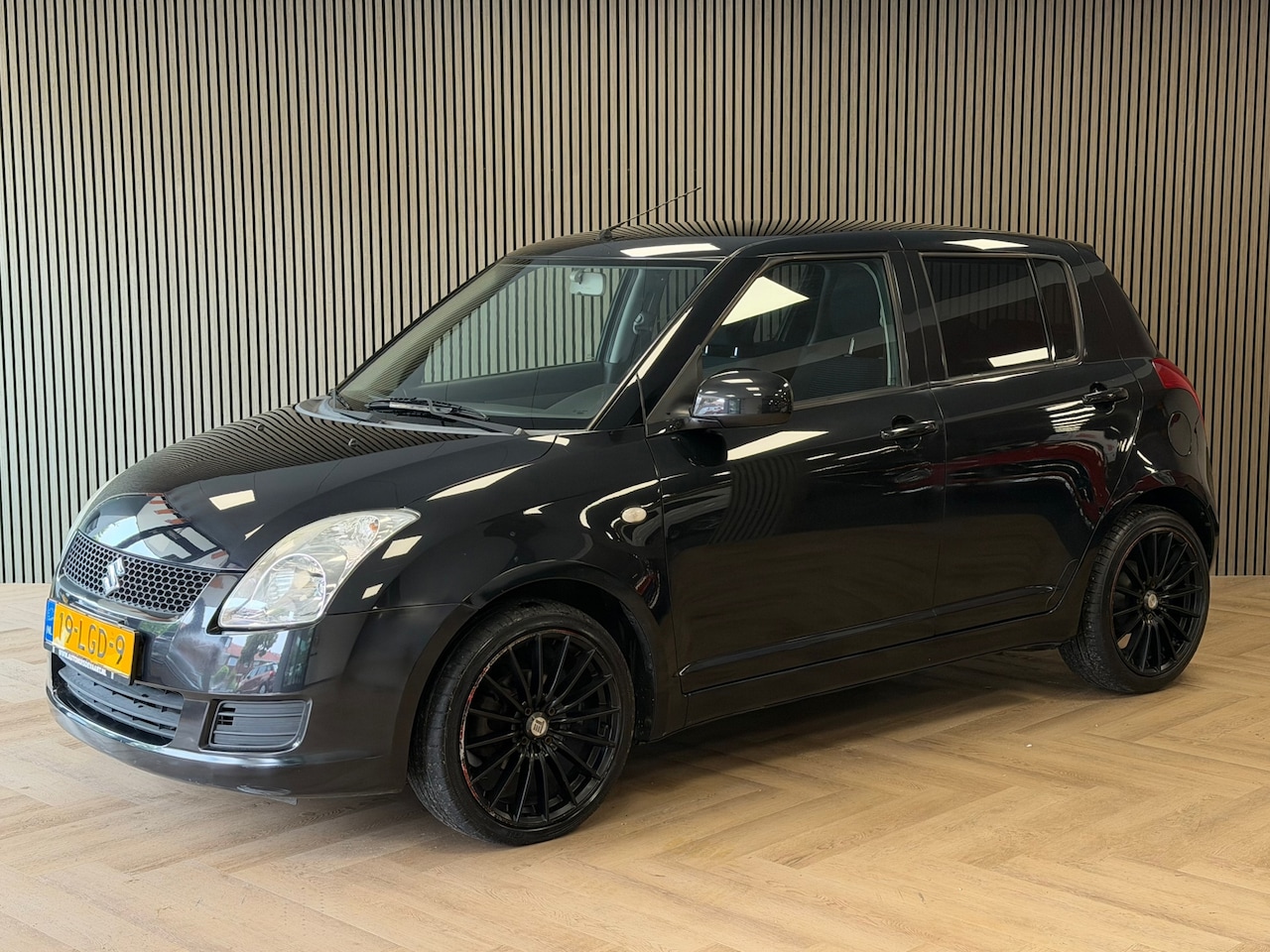 Suzuki Swift - 1.3 Cool BLUETOOTH AIRCO ELEKTRISCHE RAMEN - AutoWereld.nl