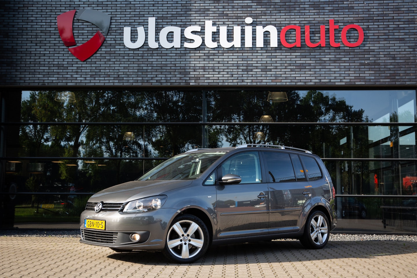 Volkswagen Touran - 1.2 TSI Highline BlueMotion 1.2 TSI Highline BlueMotion , Panoramadak, Trekhaak, Cruise control, Achteruitrijcamera, - AutoWereld.nl