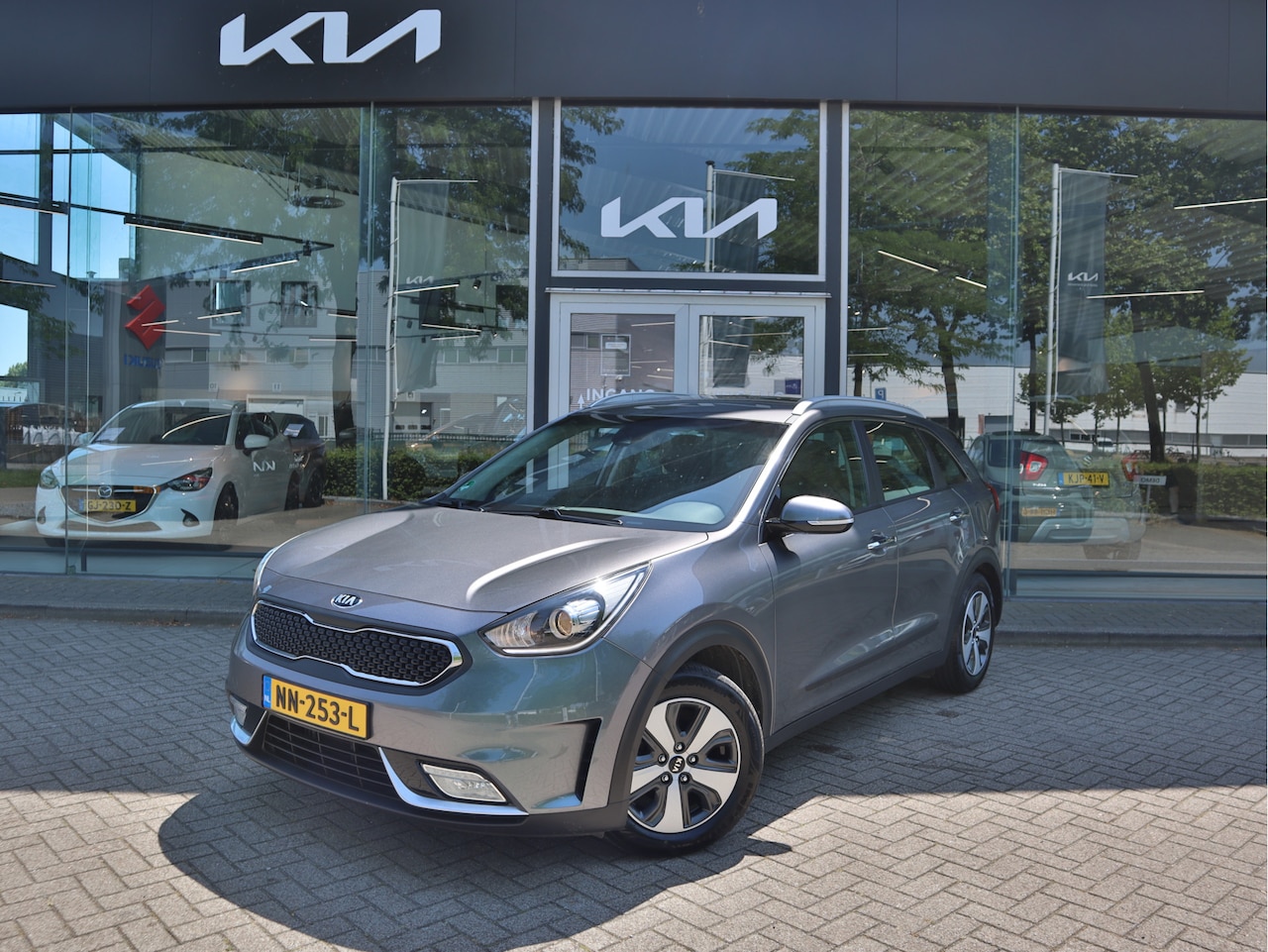 Kia Niro - 1.6 GDi Hybrid First Edition | Cruise + Climate Control | Navigatie | Airco | Tot 10Jr. Ki - AutoWereld.nl