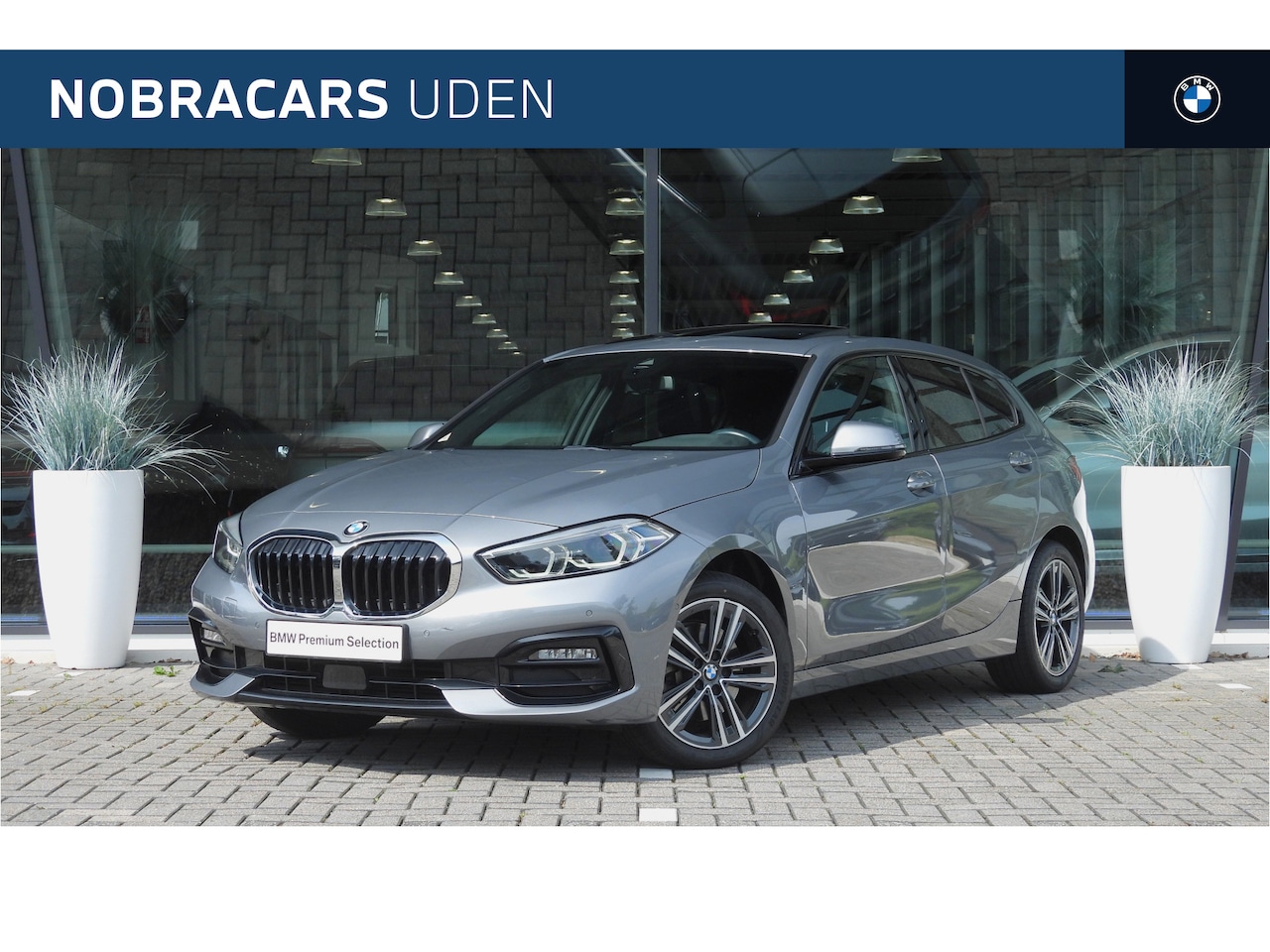 BMW 1-serie - 118i Executive Sport Line Automaat / Panoramadak / Sportstoelen / Comfort Access / Achteru - AutoWereld.nl