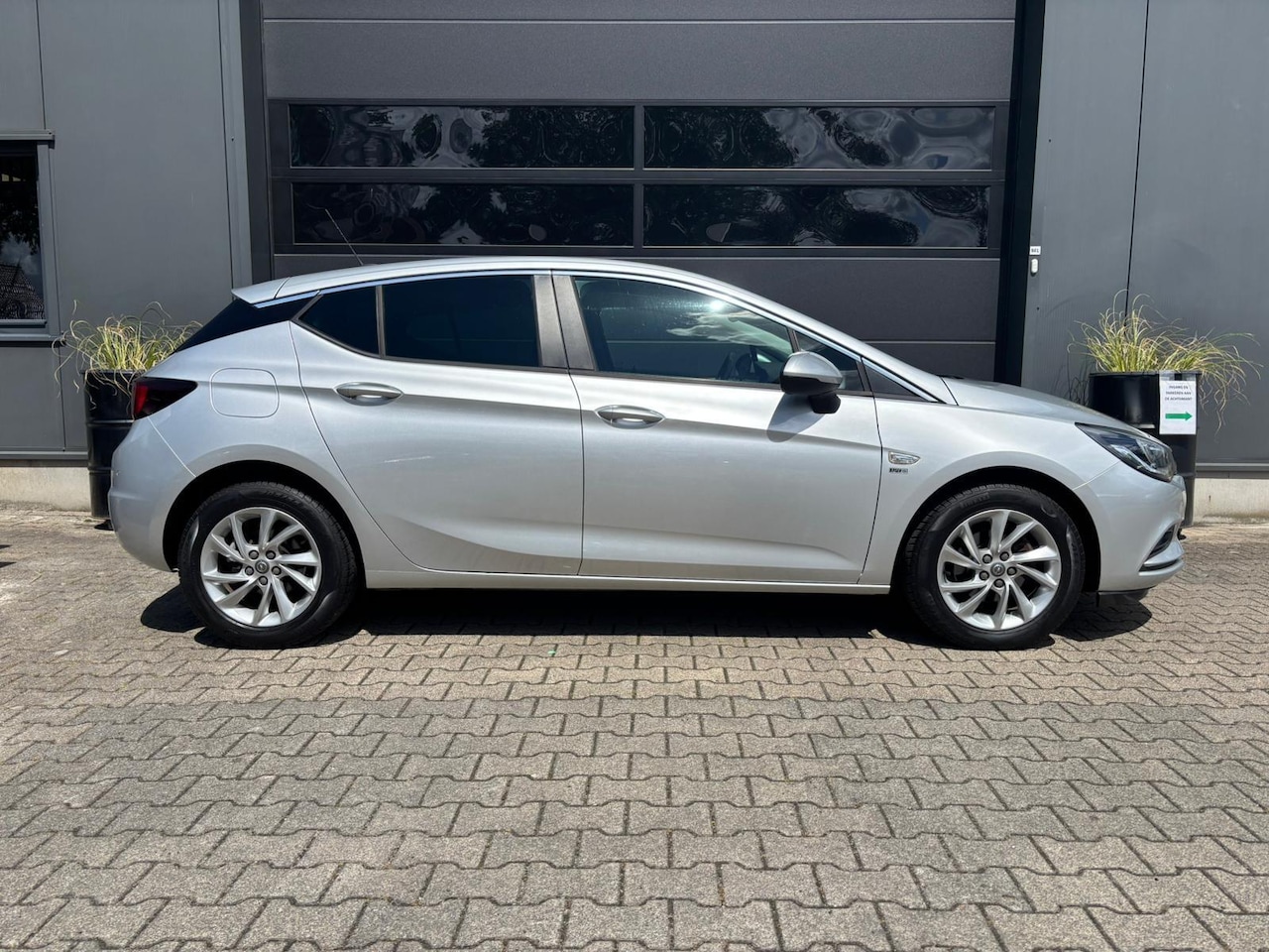 Opel Astra - 1.4 Turbo AUTOMAAT 120 Jaar Edition | AppleCarPlay/ AndroidAuto | Climate Control | Comfor