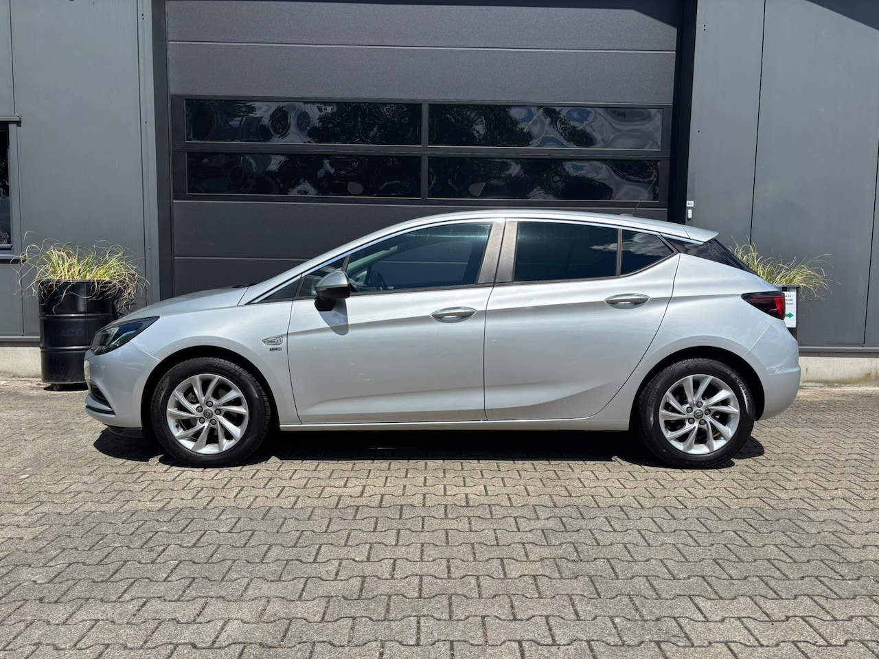 Opel Astra - 1.4 Turbo AUTOMAAT 120 Jaar Edition | AppleCarPlay/ AndroidAuto | Climate Control | Comfor