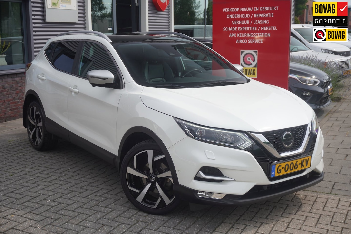 Nissan Qashqai - 1.2 Tekna + / Pano / 360 Camera / Memory / Leder / Bose / Trekhaak - AutoWereld.nl