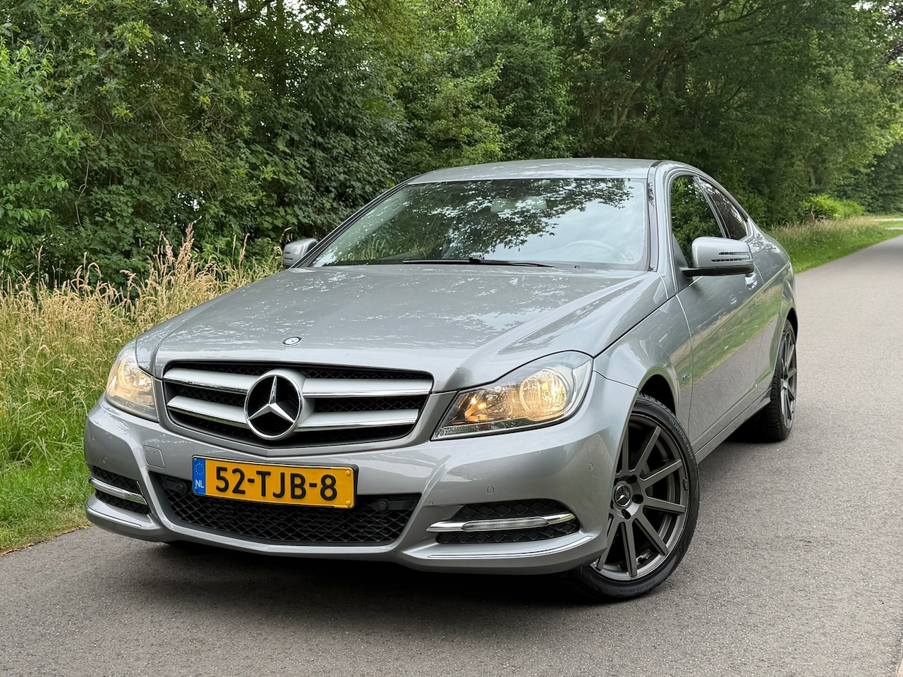 Mercedes-Benz C-klasse Coupé - 180 | ''97.000 KM + Orgineel NL + Cruise + Half/leder Nu € 11.975,-!!! - AutoWereld.nl