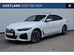 BMW i4 - eDrive40 High Executive M Sport / Schuif-kanteldak / Trekhaak / Laserlight / M Sportstoele