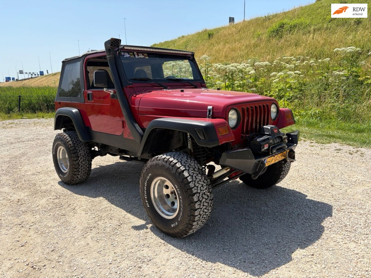 Jeep Wrangler - TJ 4.0i Sport - AutoWereld.nl