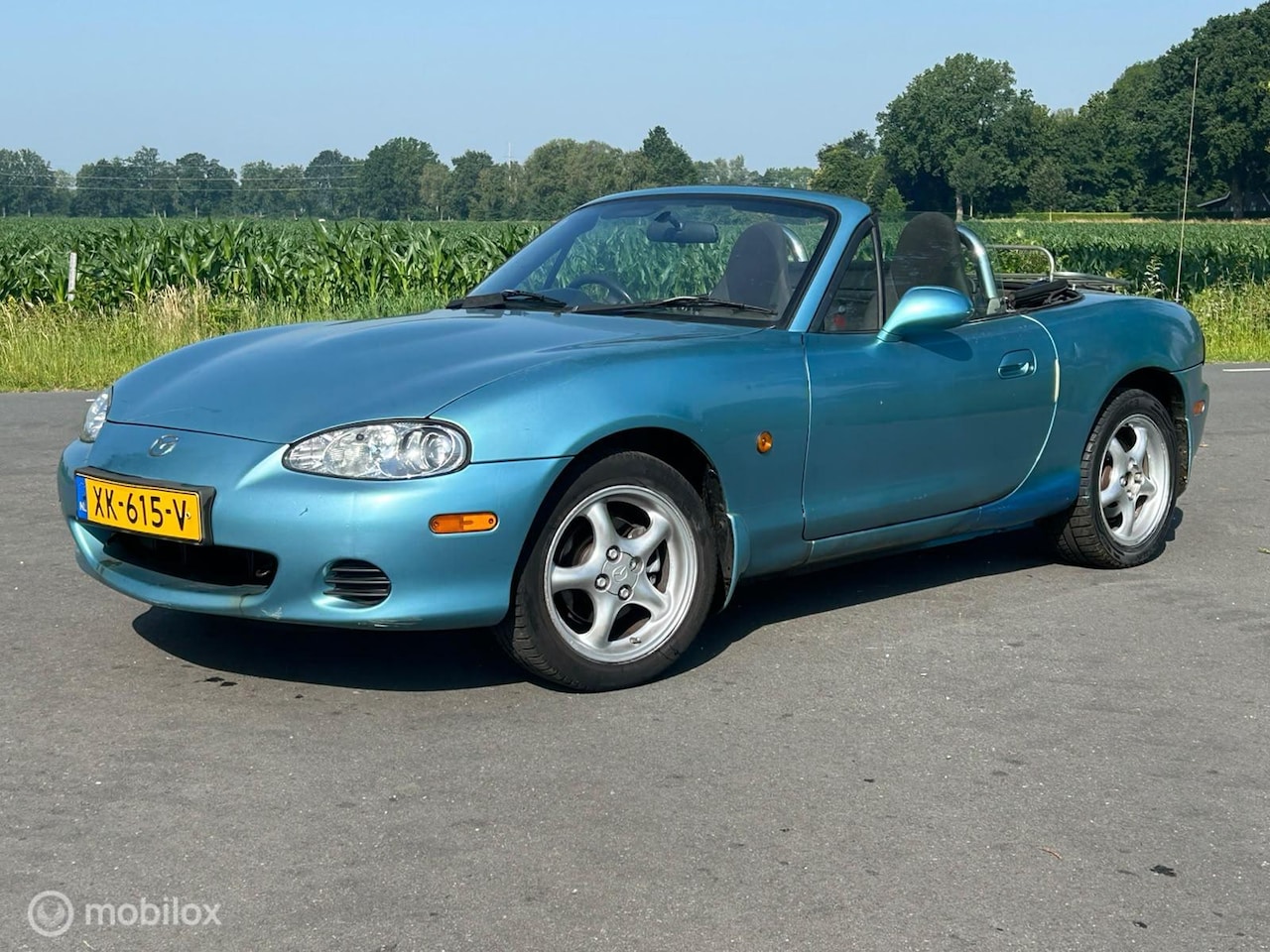 Mazda MX-5 - 1.6i RHD CrystalBlue - AutoWereld.nl
