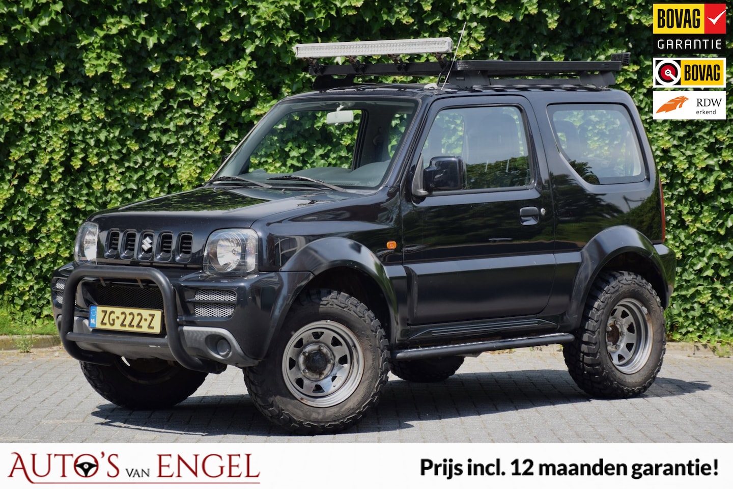 Suzuki Jimny - 1.3 JLX Airco/Garantie/Compleet aangepast/Verhoogd - AutoWereld.nl