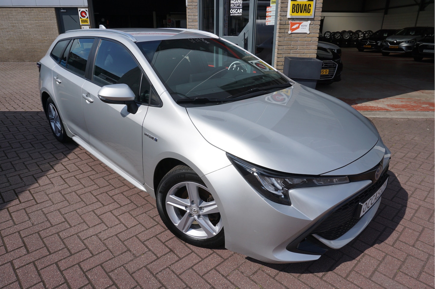 Toyota Corolla Touring Sports - 1.8I Hybrid Active Automaat - AutoWereld.nl