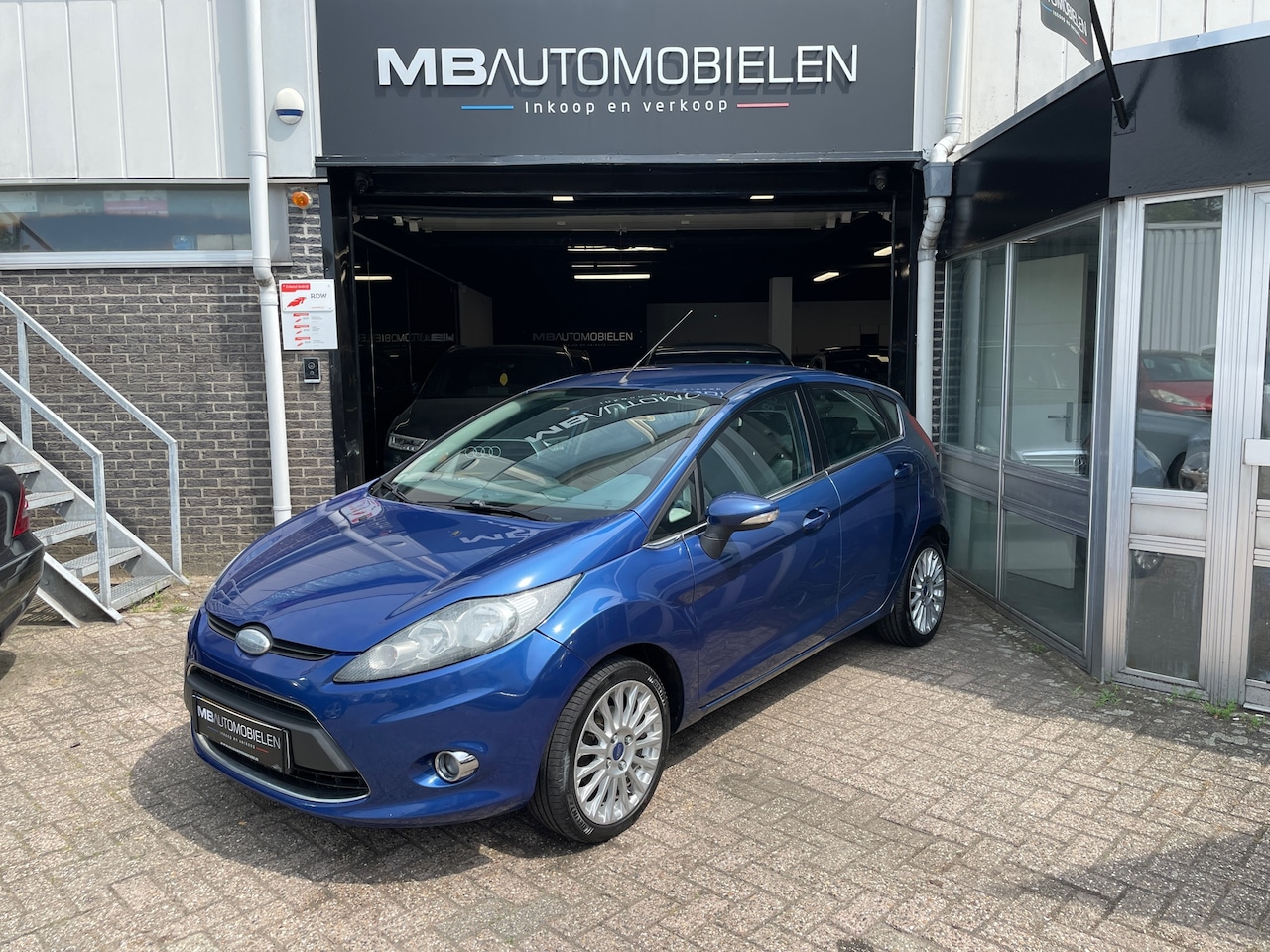 Ford Fiesta - 1.25 Ghia//5DRS/Airco/Blauw/176DKM/APK/Onderhoudshistorie! - AutoWereld.nl