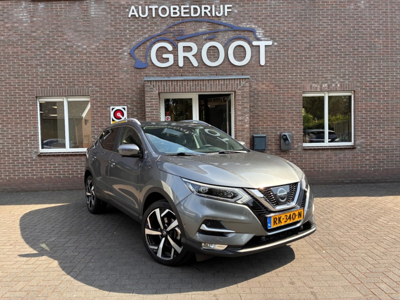 Nissan Qashqai - 1.6 163PK! TEKNA +   1e EIG/1500KG TREK. / 360* CAMERA/BOSE - AutoWereld.nl