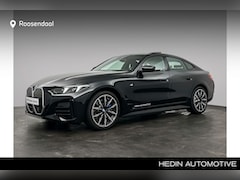 BMW i4 - eDrive35 70 kWh | Trekhaak | Schuifdak | Stoelverwarming | Stuurverwarming | Hifi |