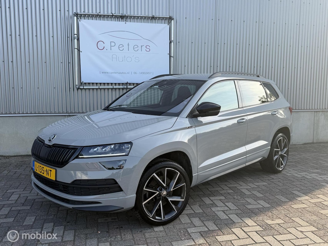 Skoda Karoq - 1.5 TSI ACT Sportline Business 2021 / Virtual Cockpit / LED / Camera / Trekhaak / 1e eigen - AutoWereld.nl