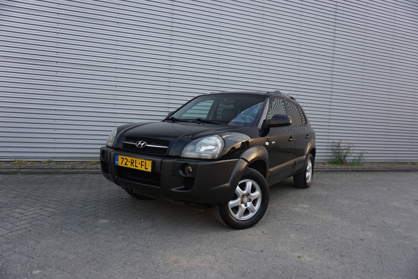 Hyundai Tucson - 2.7i V6 4WD Style AUTOMAAT - Climate / Cruise / Leder / Stoelverw. / Trekhaak / Lm velgen - AutoWereld.nl