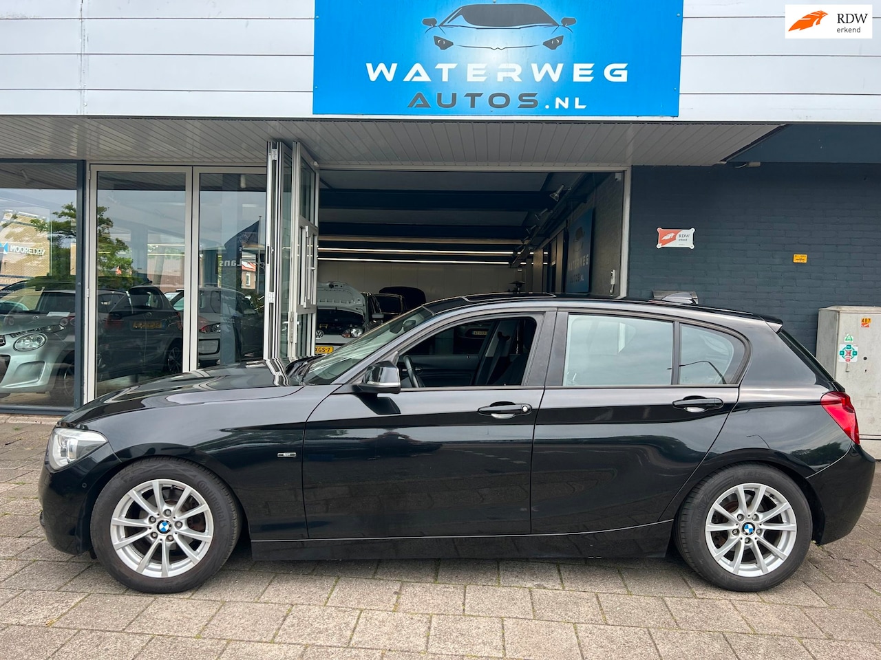 BMW 1-serie - 116i Business Navi/Clima/PDC/Open da/Cruise - AutoWereld.nl