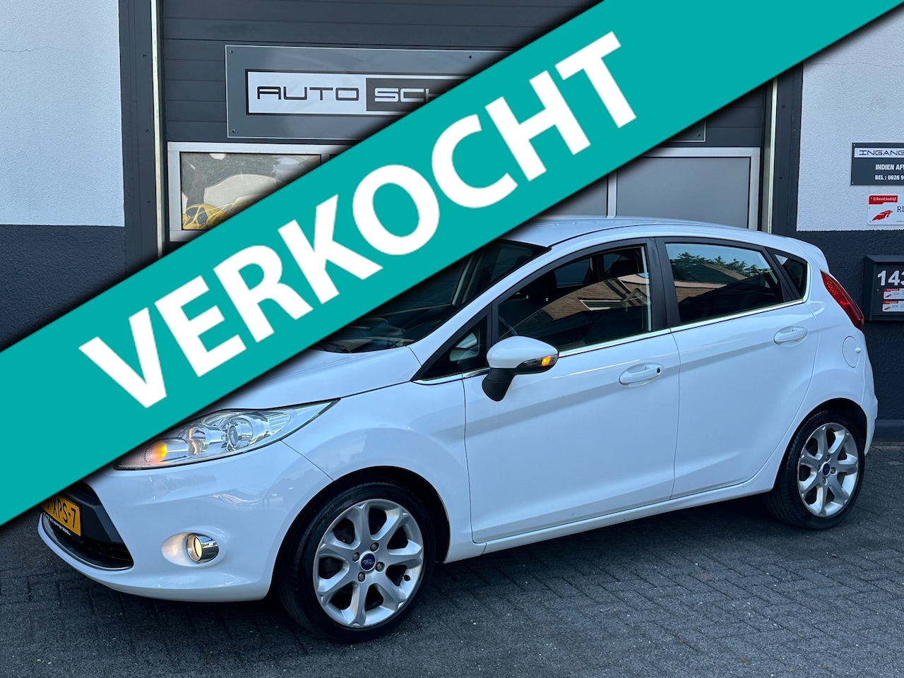 Ford Fiesta - 1.25 82pk Titanium | AIRCO | CRUISE | NL AUTO - AutoWereld.nl