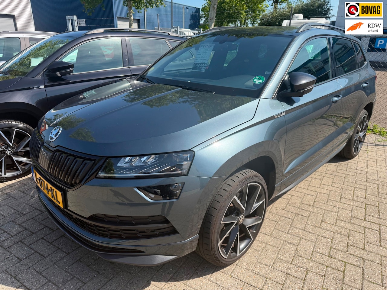 Skoda Karoq - 1.5 TSI ACT Sportline Business|Virtual Display|Automaat|Trekhaak|Cruise|Camera|all-in - AutoWereld.nl