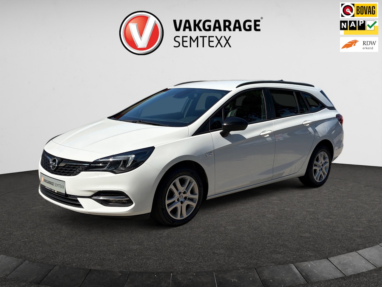 Opel Astra Sports Tourer - 1.2 Business Edition | Org. NL Auto | 1ste Eigen. | Airco | Cruise | Dakrails | Navi | PDC - AutoWereld.nl