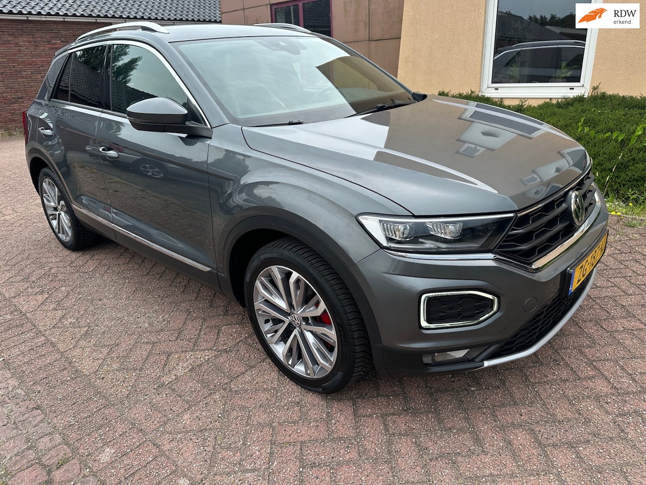Volkswagen T-Roc - 1.5 TSI Sport VAVI/PDC/LED/VOLOPTIES - AutoWereld.nl
