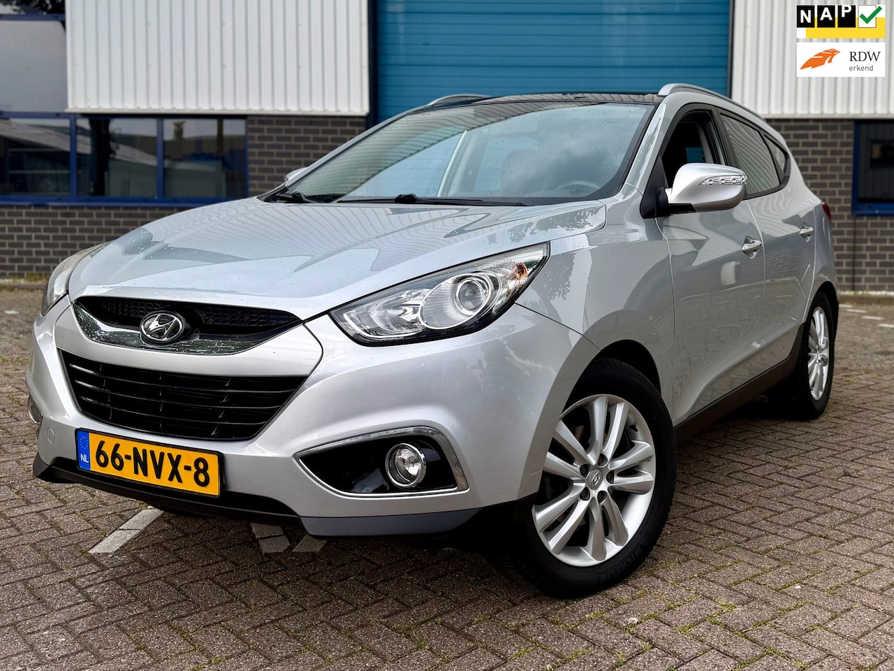 Hyundai ix35 - 2.0i i-Catcher * PANORAMA * APPLE CARPLAY * STOELVERWARMING * ACHTERUITRIJCAMERA * NAP * - AutoWereld.nl