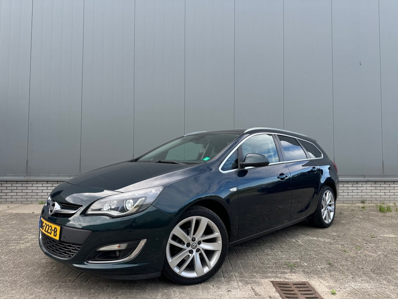 Opel Astra Sports Tourer - 1.4 Turbo Sport + |Camera | NL Auto | Navi | Trekhaak - AutoWereld.nl