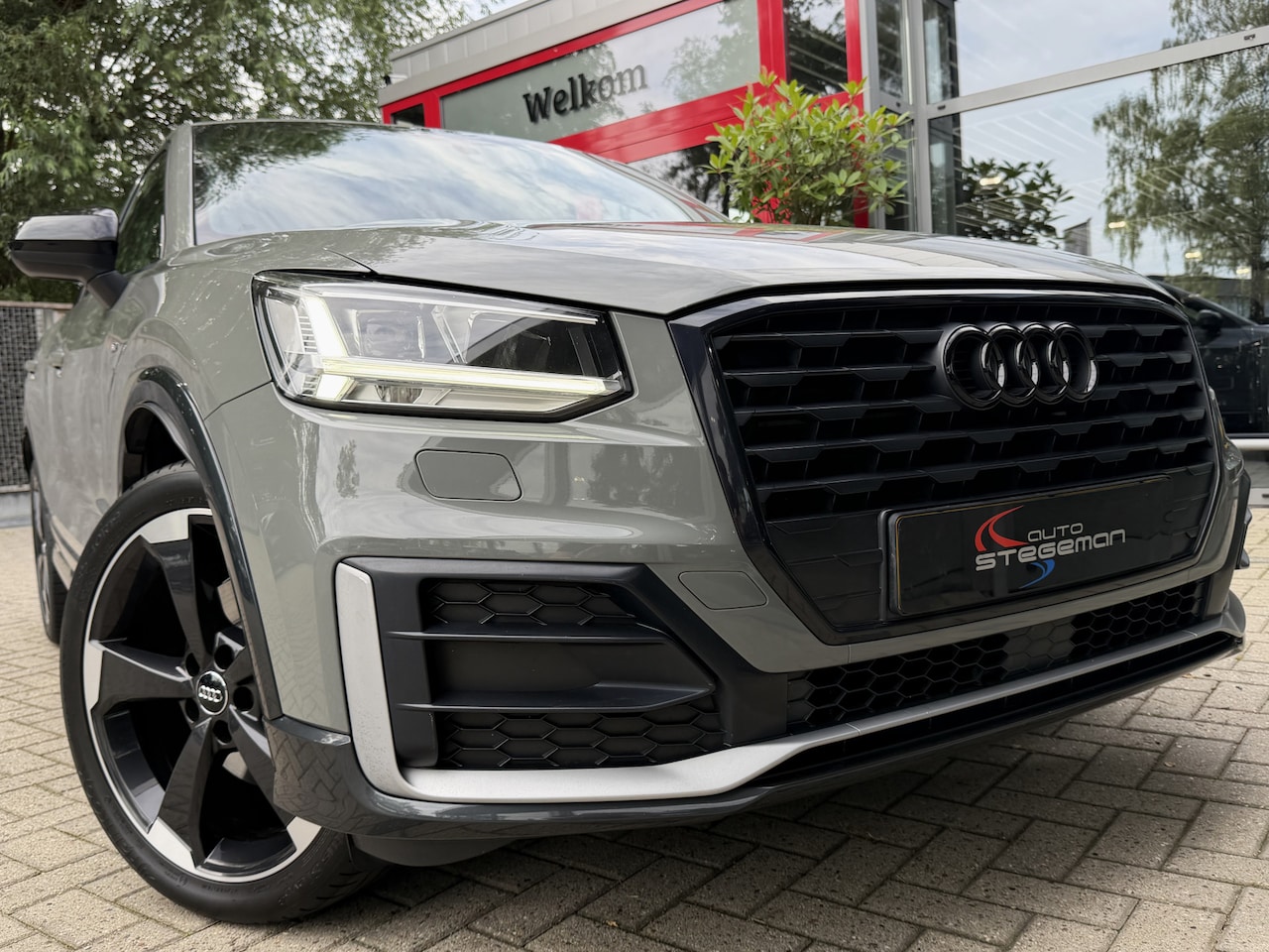 Audi Q2 - 1.4 TFSI CoD 150PK AUT. *!* 2x S-LINE *!* NAVI/ 19 INCH/ LED/ CRUISE/ QUANTUM GREY *!* - AutoWereld.nl