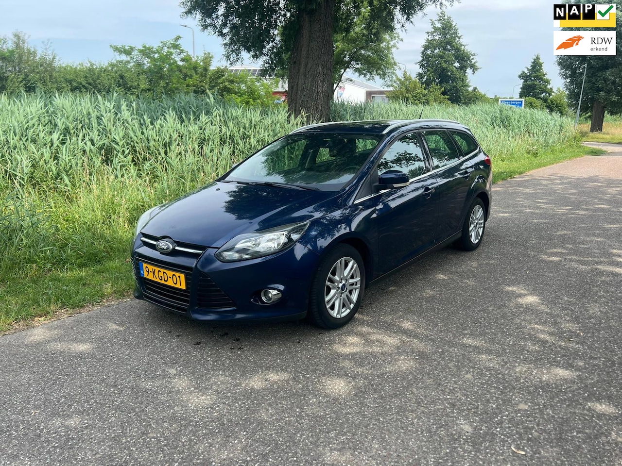 Ford Focus Wagon - 1.0 EcoBoost Titanium Airco Cruise Pdc Navi - AutoWereld.nl