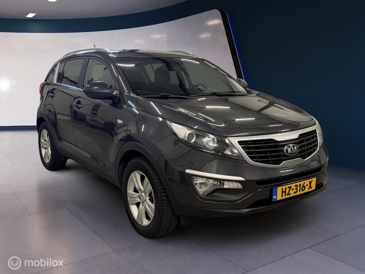Kia Sportage - 1.6 GDI Super Pack ✓Trekh.✓Airco✓Allseasonband. - AutoWereld.nl