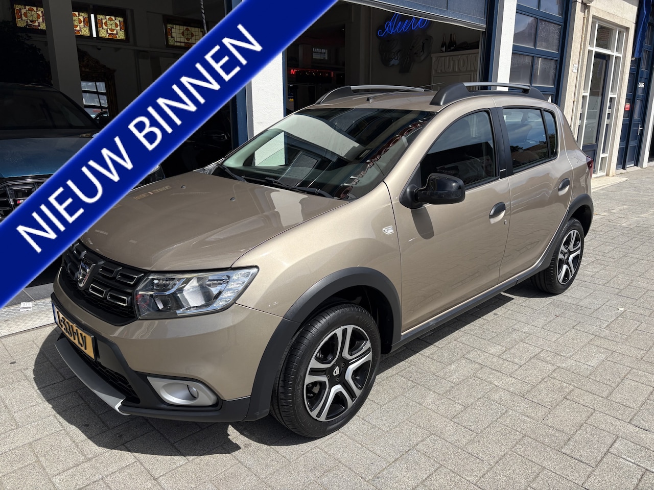 Dacia Sandero Stepway - 0.9 TCe SL AIRCO/NAVI/BLUETOOTH/CRUISE - AutoWereld.nl