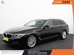 BMW 5-serie Touring - 530e Business PHEV AUTOMAAT Adaptieve cruise control LED Leder Navigatie Stoelverwarming A