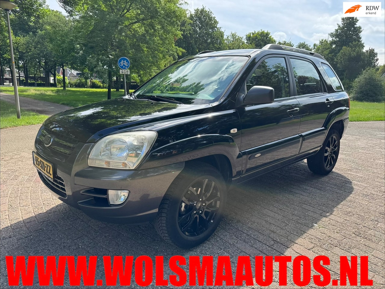 Kia Sportage - 2.0 CVVT Executive 2.0 CVVT Executive - AutoWereld.nl