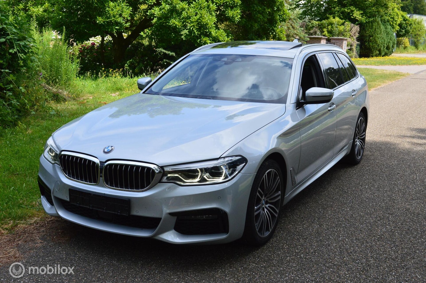 BMW 5-serie Touring - 520D M-Sport / 2019 / ACC / HUD / 360c - AutoWereld.nl