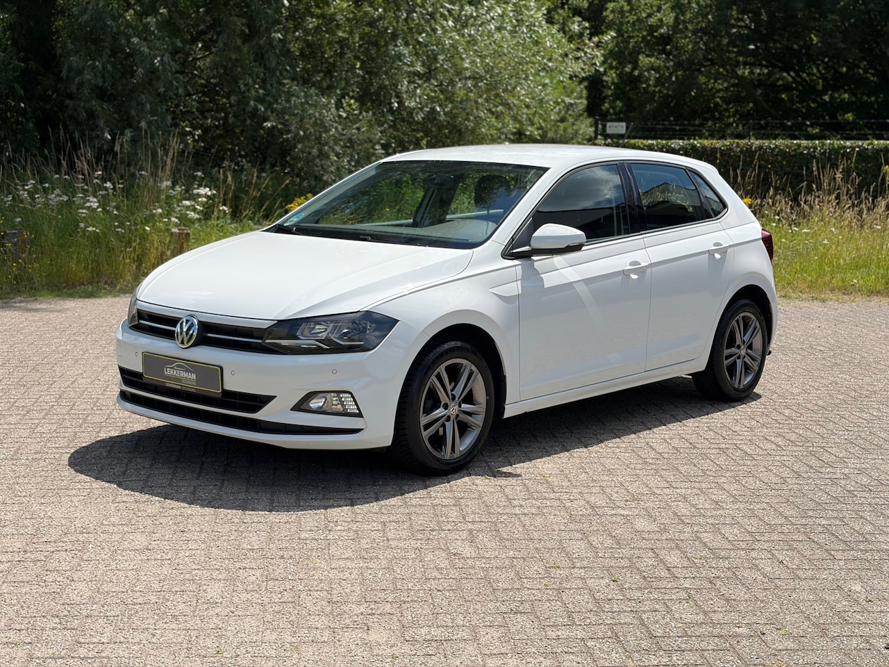 Volkswagen Polo - 1.0 TSI Highline CARPLAY I CRUISE I R-LINE VELGEN I KEYLESS I 1E EIG - AutoWereld.nl