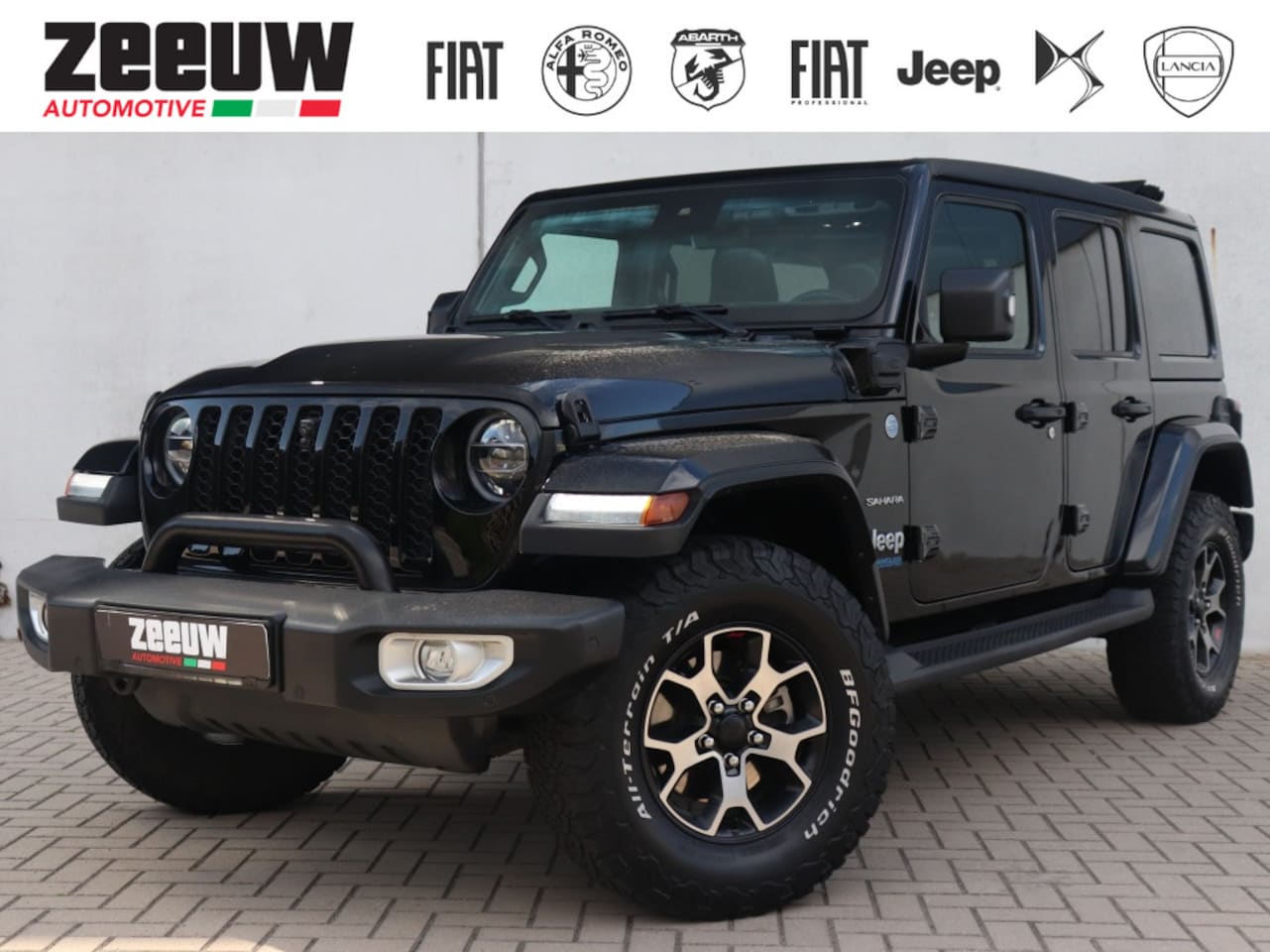 Jeep Wrangler Unlimited - 4xe 380 PK Sahara | Schuifdak | Leder | Offroad | Camera | Navi - AutoWereld.nl