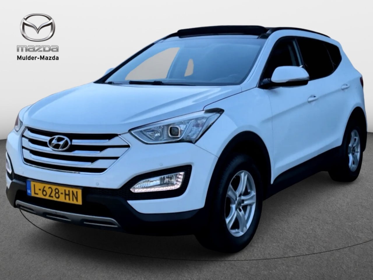 Hyundai Santa Fe - 2.4i GDI i-Motion | Panoramadak | Camera | Trekhaak | PDC - AutoWereld.nl