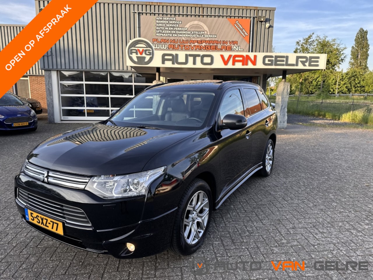 Mitsubishi Outlander - 2.0 PHEV Leder Panodak Xenon NL Auto NAP Luxe Uitv. - AutoWereld.nl