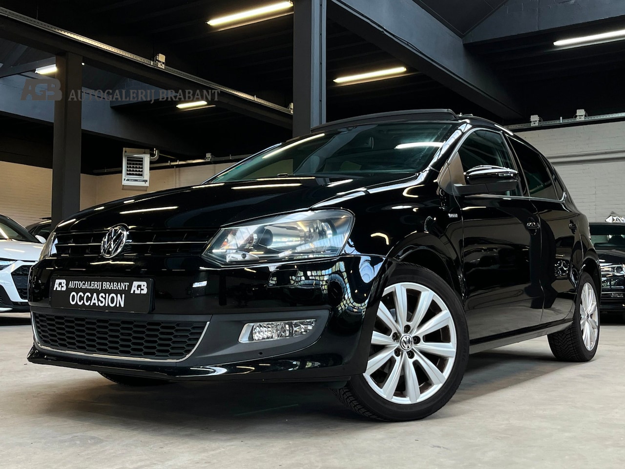 Volkswagen Polo - 1.2 TSI Highline Automaat/Pano/Navi/ - AutoWereld.nl