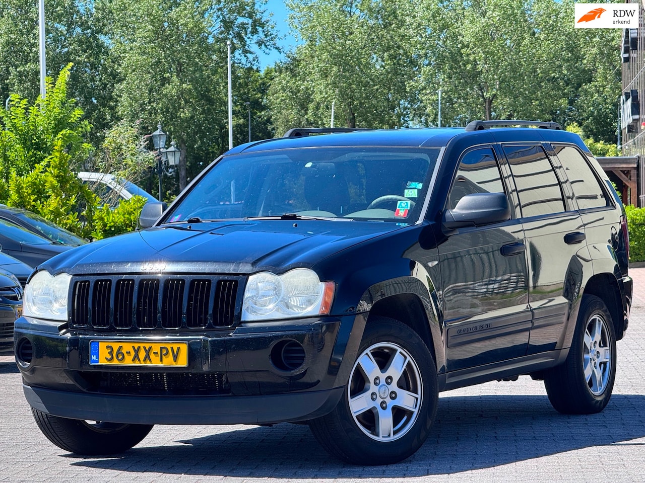 Jeep Grand Cherokee - 3.7 V6 Laredo | Leder elektrische stoelen | G3 Prins LPG | Parkeersensoren | Airco | Elekt - AutoWereld.nl