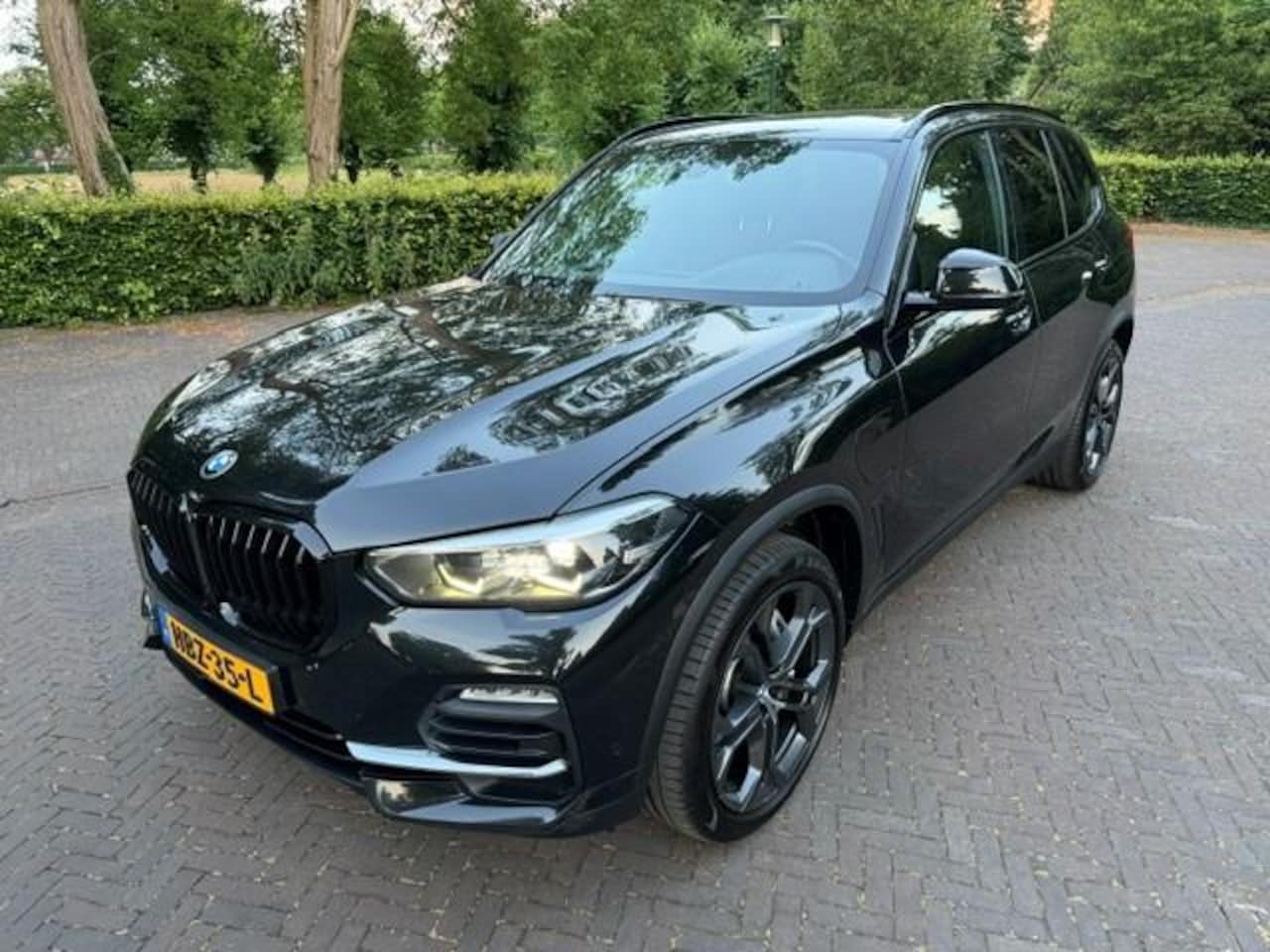 BMW X5 - xDRIVE45e High Executive Sport/ Luchtvering/Camera/Leer/Acarplay - AutoWereld.nl