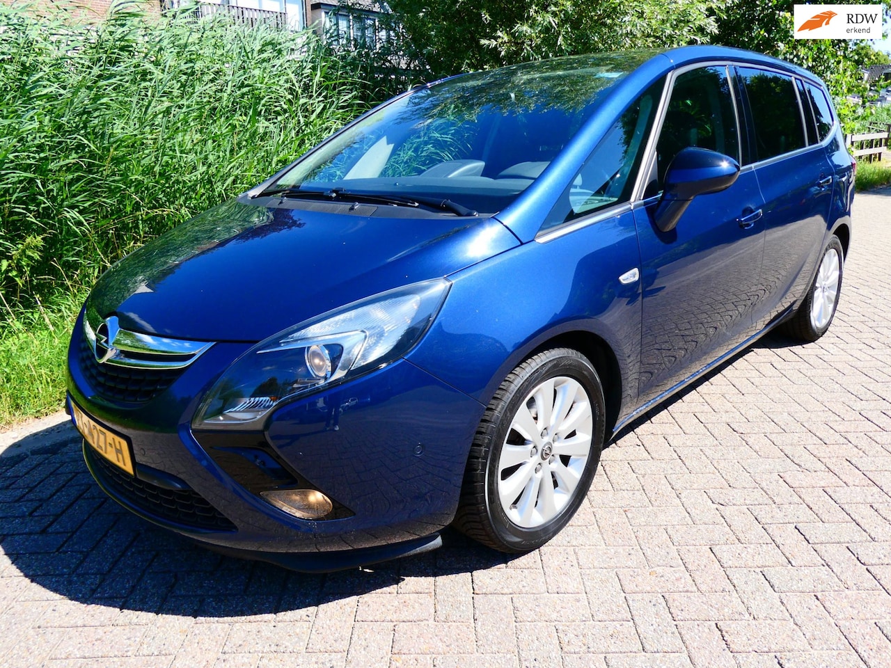 Opel Zafira Tourer - 1.4 Cosmo 120pk 7-Persoons Clima Cruise Navi Panorama - AutoWereld.nl
