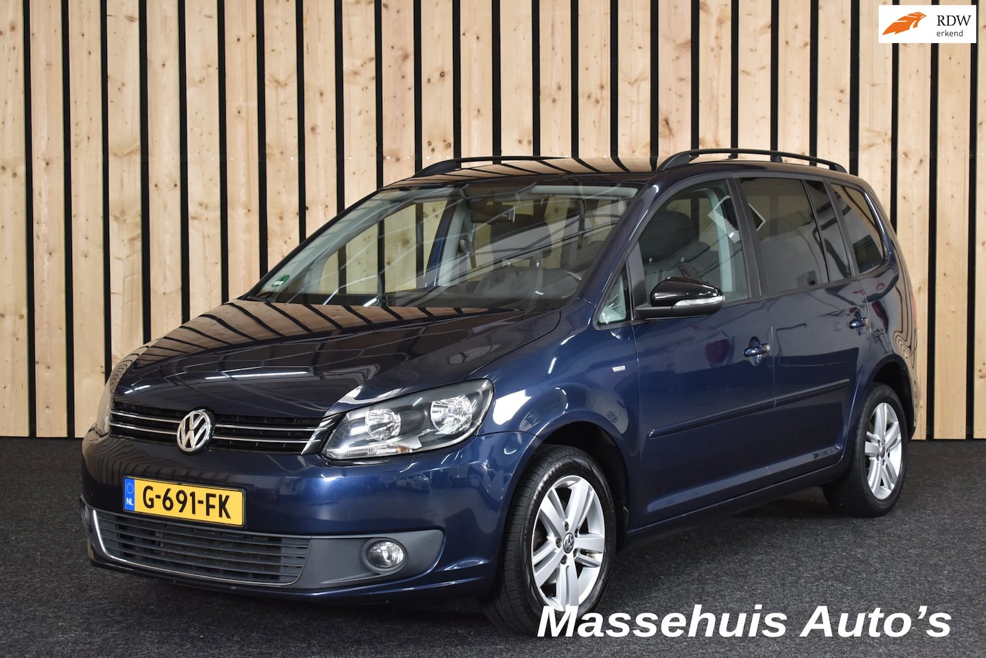Volkswagen Touran - 1.2 TSI Easyline 7p. Clima Navi Cruise Stoelverwarming All seasons PDC + Nwe APK - AutoWereld.nl