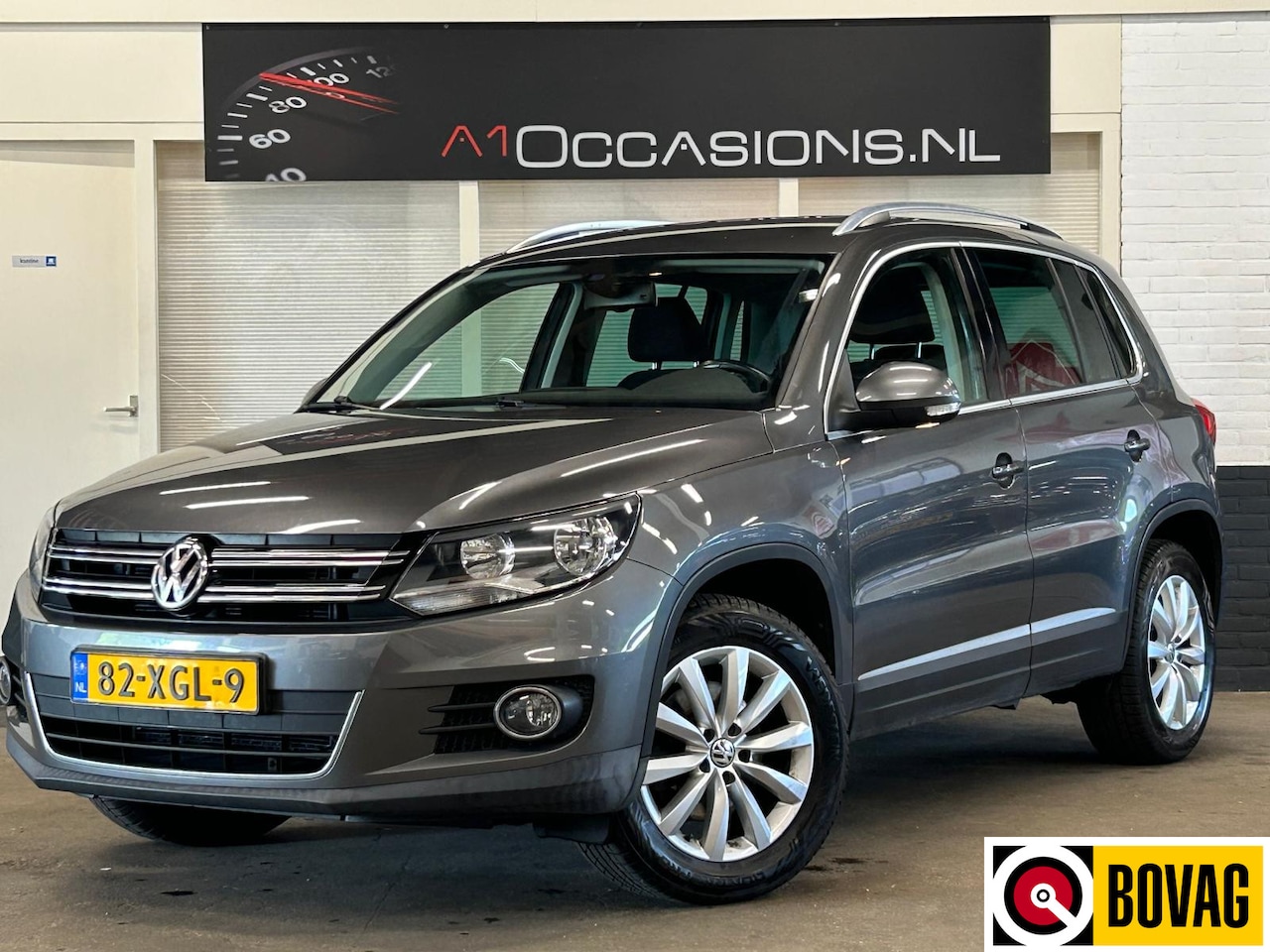 Volkswagen Tiguan - 1.4 TSI Sport&Style - AutoWereld.nl