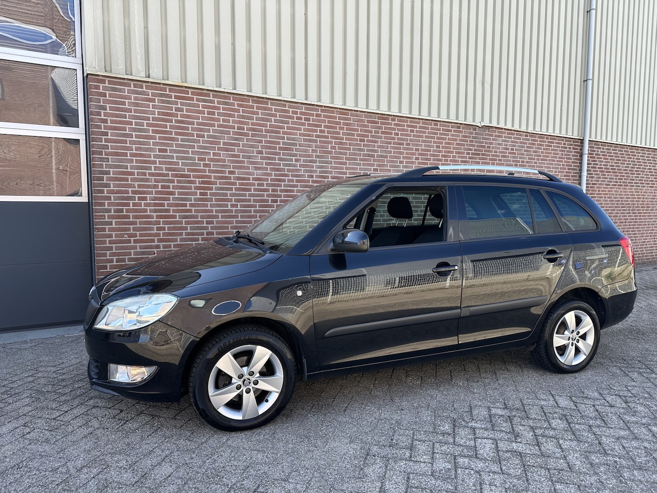 Skoda Fabia Combi - 1.2 TSI Drive Airco,Cruise,Navi,Pdc,Lmv - AutoWereld.nl