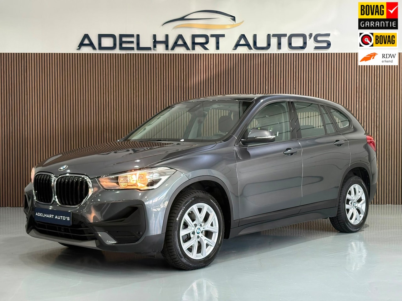 BMW X1 - SDrive18i Business Edition Automaat / Navigatie full map / Cruise control / Climate contro - AutoWereld.nl
