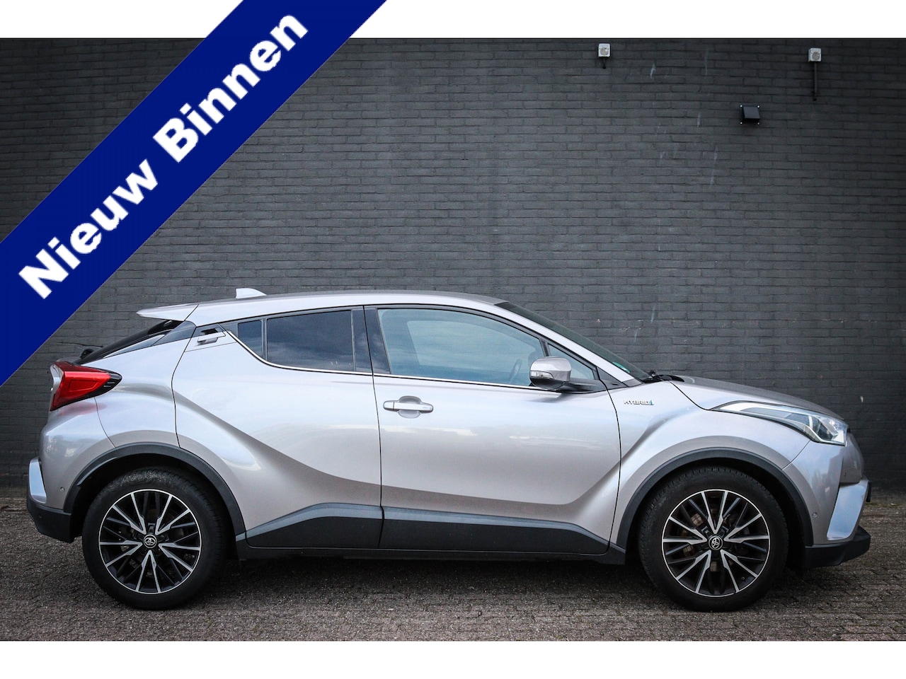 Toyota C-HR - 1.8 Hybrid Executive Net binnen-Nu al te bezichtigen - AutoWereld.nl