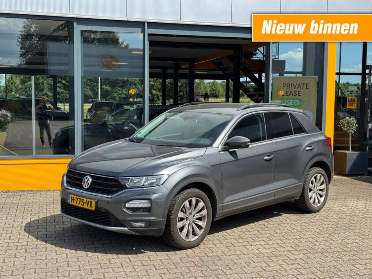 Volkswagen T-Roc - 1.5 TSI 150pk DSG Sport - trekhaak - adaptive - climate control - AutoWereld.nl