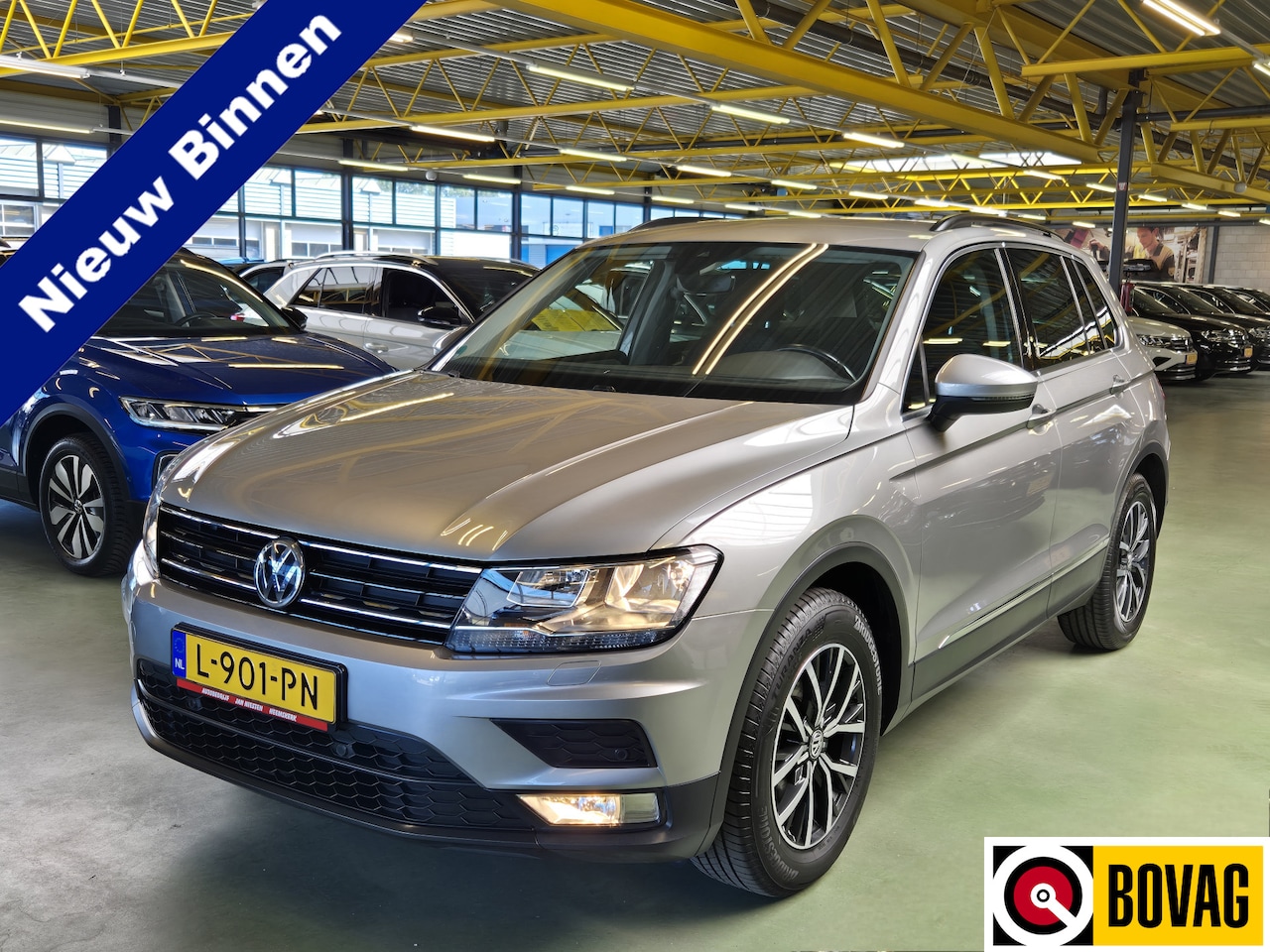 Volkswagen Tiguan - 1.4 TSI ACT Comfortline -150pk- Automaat | Camera | Navi | Parkeersensoren | Rijklaarprijs - AutoWereld.nl
