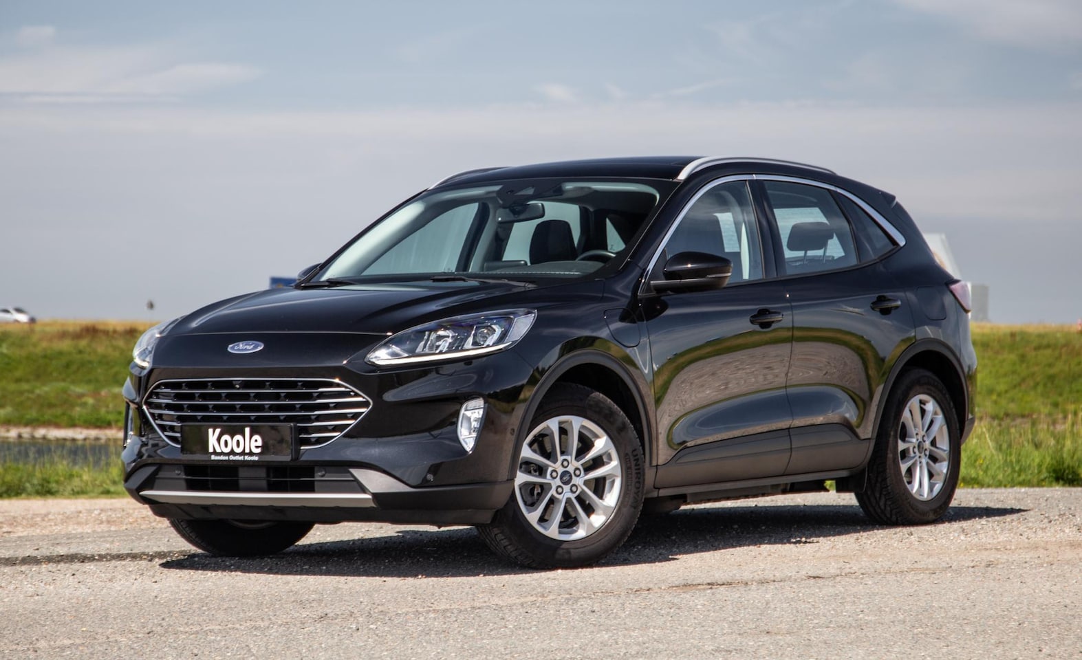 Ford Kuga - 2.5 PHEV Titanium PANORAMA DAK / CAMERA / CRUISE CONTROLE / STOEL VERWARMING / CARPLAY - AutoWereld.nl
